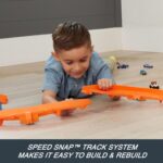 Hot Wheels Toy Car Track Set, Deluxe Building Box with Motorized Booster, 1:64 Scale Vehicle, Speed Snap Track, Boosted Jump Speedway - Image 3