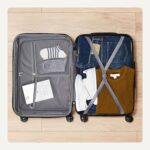 Amazon Basics 21" Hardside Carry-On Luggage with Spinner Wheels, Expandable for Up to 25% More Space, Scratch-Resistant Hard Shell, Telescoping Handle, Black - Image 4