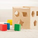 Melissa & Doug Shape Sorting Cube - Classic Wooden Toy With 12 Shapes - Image 7