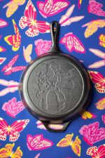 Lodge 10.25 Inch Dolly Parton Pre-Seasoned Cast Iron Stamped Skillet - Signature Teardrop Handle - Use in the Oven, on the Stove, on the Grill, or Over a Campfire, Black - Image 3
