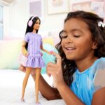 Barbie Fashionistas Doll #245, Autistic Doll Wearing Purple Striped Dress with Accessories Like Fidget Spinner, Tablet and Headphones - Image 2