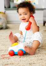 Fisher-Price Toddler Pull Toy Chatter Telephone Pretend Phone with Rotary Dial and Wheels for Walking Play Ages 1+ years​ - Image 2