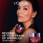 L'Oreal Paris Revitalift Triple Power Anti-Aging Face Moisturizer, Pro Retinol, Hyaluronic Acid & Vitamin C to Reduce Wrinkles, Firm & Brighten Skin, 1.7 Oz - Image 2