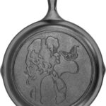 Lodge 10.25 Inch Dolly Parton Pre-Seasoned Cast Iron Stamped Skillet - Signature Teardrop Handle - Use in the Oven, on the Stove, on the Grill, or Over a Campfire, Black