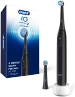 Oral-B Rechargeable Electric Toothbrush, iO2 Starter Kit, 3 Cleaning Modes, Automatic Pressure Sensor to Protect Gums, 2 Brush Heads, Night Black